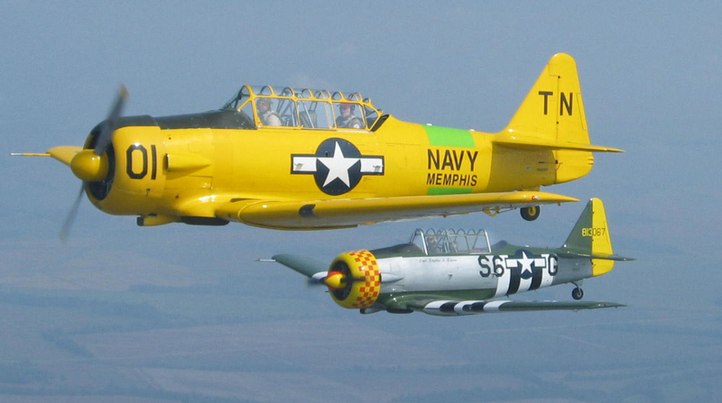 There are a couple of T-6 Texans based at KDWH. This pic is particularly appropriate since one of the KDWH planes is yellow and the other silver, although neither of these are the same planes.